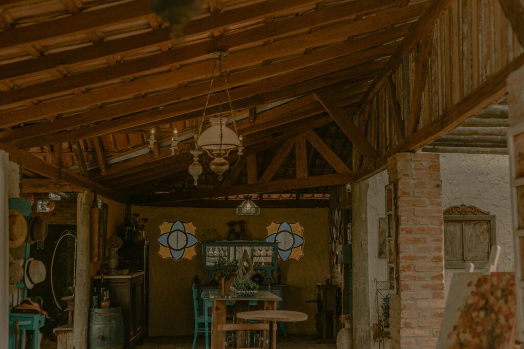 Cozy rustic interior with vintage decor and wooden elements in São Paulo, Brazil.